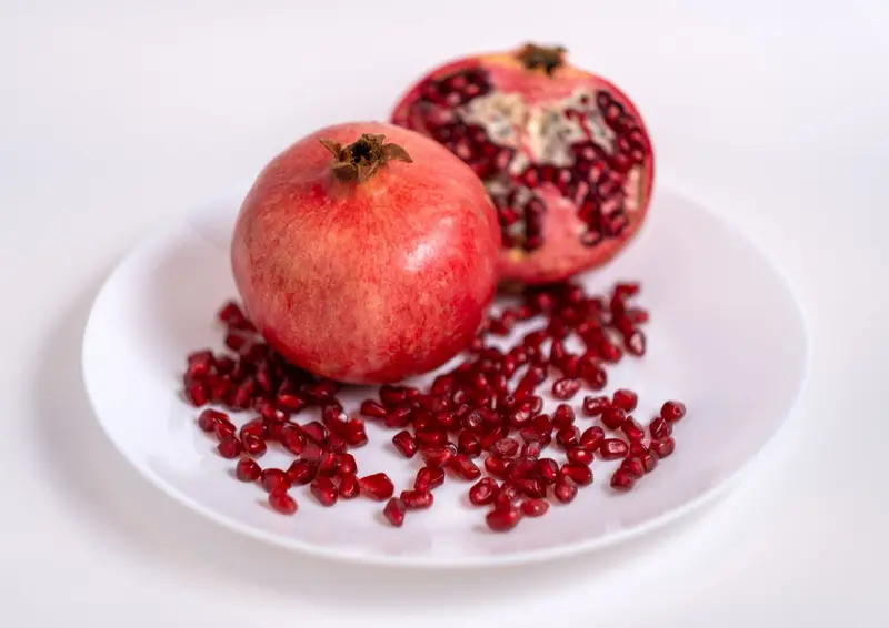 Ripe Bhagwa pomegranates with red arils